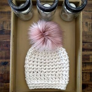 Soft cream hat with fluffy light pink pompom